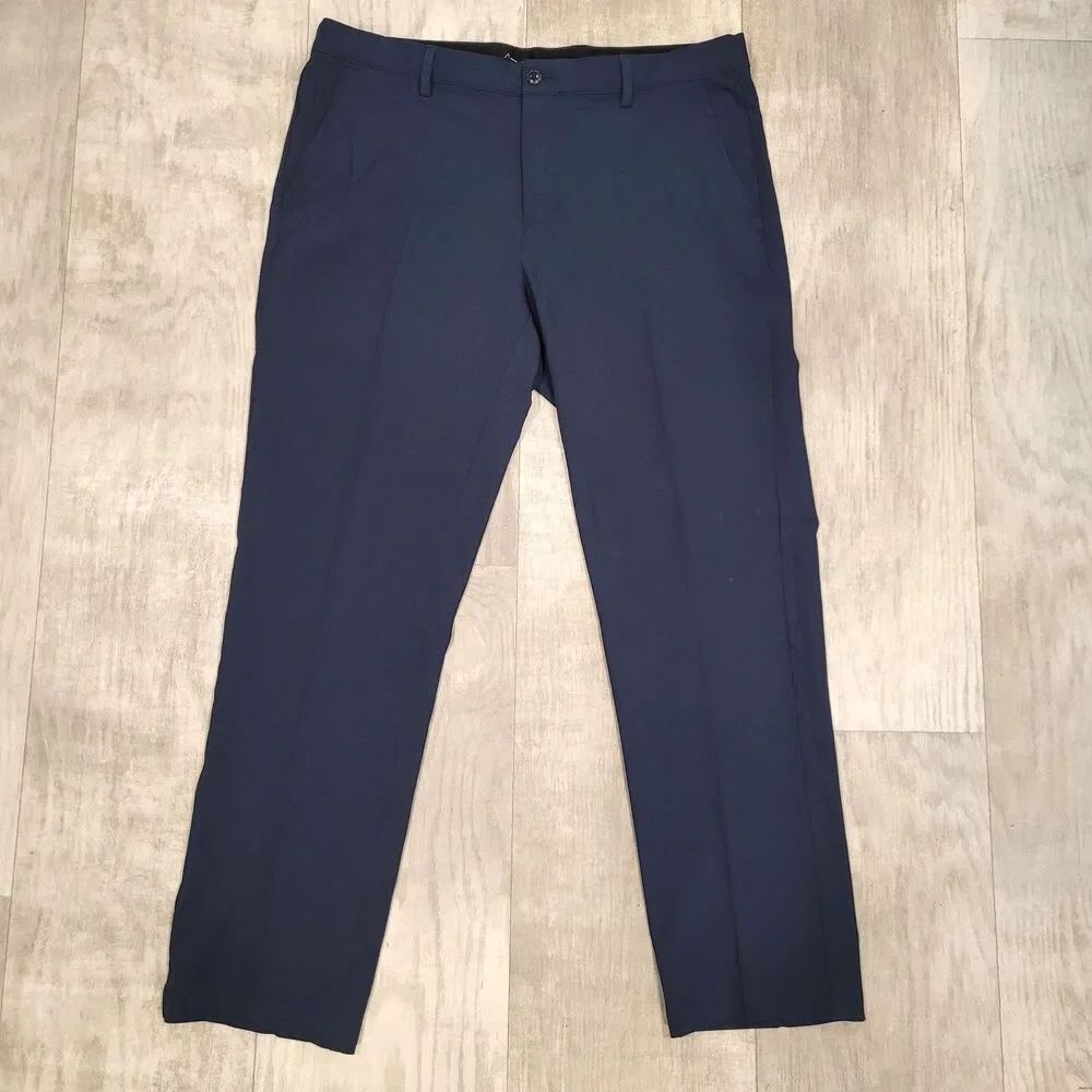 Greg Norman Mens Golf Pants 34x30 (Act 34x29) Blue Stretch Performance Chino